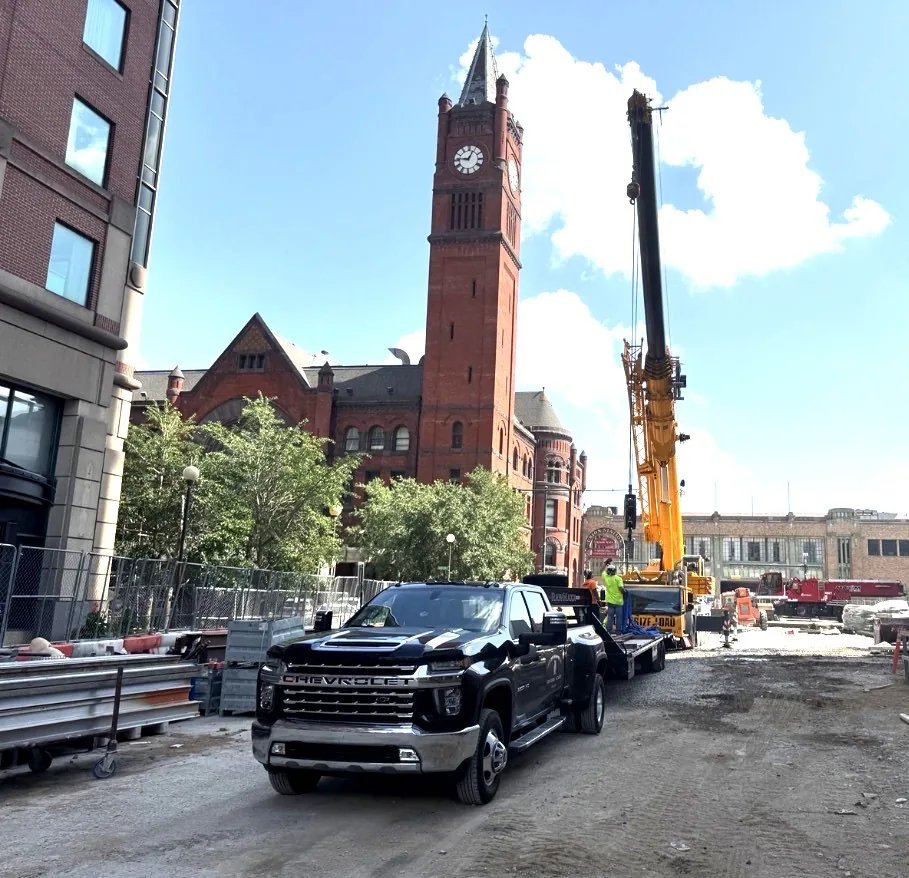 Centurion Transport truck and trailer at an active commercial jobsite in downtown Indianapolis